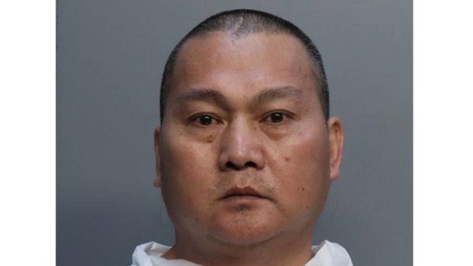 Prosecutors charged 45-year-old Chen Wu with four counts of first-degree murder. Photo / AP