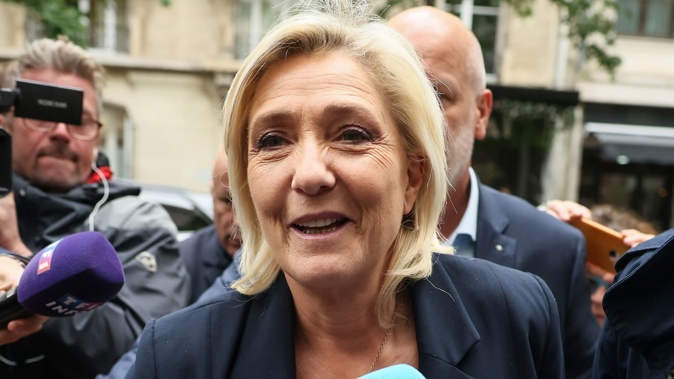 French far-right leader Marine Le Pen arrives at the National Rally party headquarters. Photo / AP