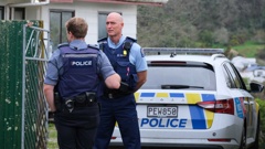 Police at a Te Kuiti property at the centre of a homicide investigation into the death of a 10-month-old baby boy. Photo / Maryana Garcia