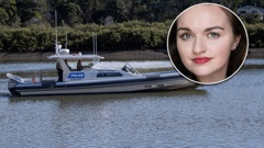 A police boat scours West Auckland waterway for missing Te Te Atatū woman Monica Reid.