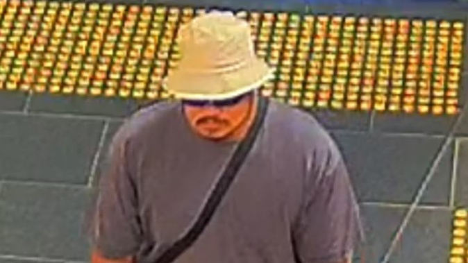 This man and another woman got off at Fruitvale Station after a train manager was knocked out. Photo / New Zealand Police