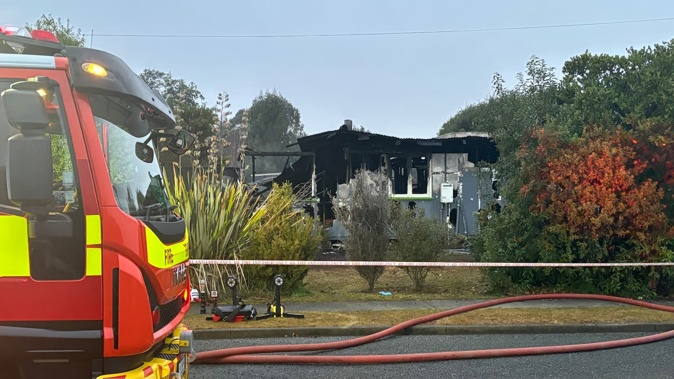 Two people were located deceased in a house fire on View Street in Manapouri on 5 July 2024. Photo / Southland App