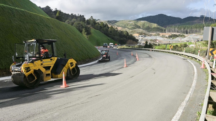 Contractors tarsealing State Highway One at the Brynderwyn Hills this week. Photo / Waka Kotahi