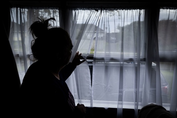 The tenant in her house after it was targeted in a drive-by shooting in Māngere East. Photo / Jason Oxenham