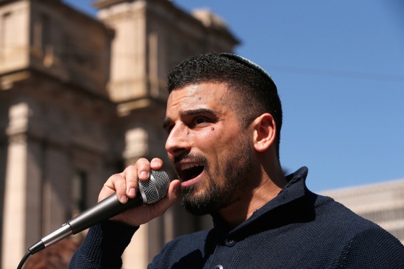 Avi Yemini speaking to right-wing protesters in Melbourne in 2017. Photo /  Getty Images