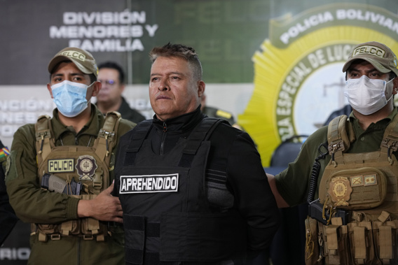 Bolivian police hold the detained Juan Jose Zuniga, former general commander of the Army, in La Paz, Bolivia, Wednesday, June 26, 2024. An apparent failed coup attempt erupted Wednesday in the country, and Zuniga appeared to be leading the rebellion. (AP Photo/Juan Karita)