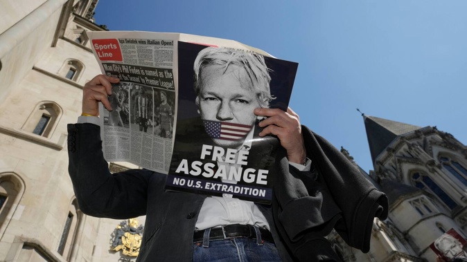 A British court has ruled that WikiLeaks founder Julian Assange can appeal against an order that he be extradited to the US on espionage charges. Photo / AP