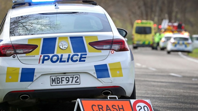 Two vehicles were travelling “at speed” and overtaking each other when one collided with an oncoming car, killing its driver, police understand. Photo / NZME